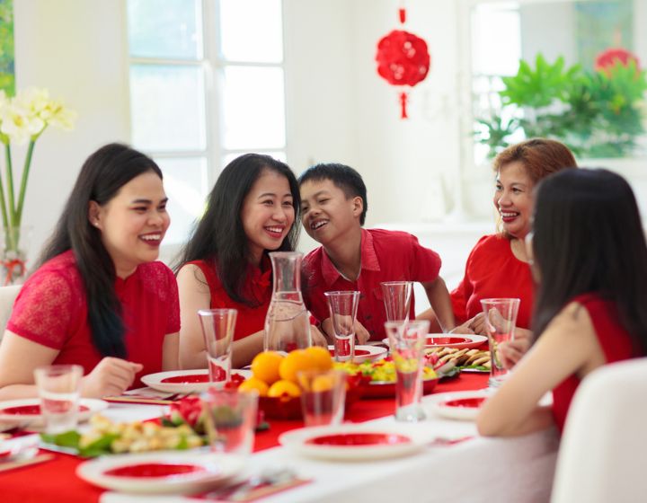 Chinese New Year celebration. Family celebrating winter holiday. Traditional festive dinner