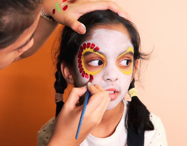 parties play easy halloween face painting sugar skull petals